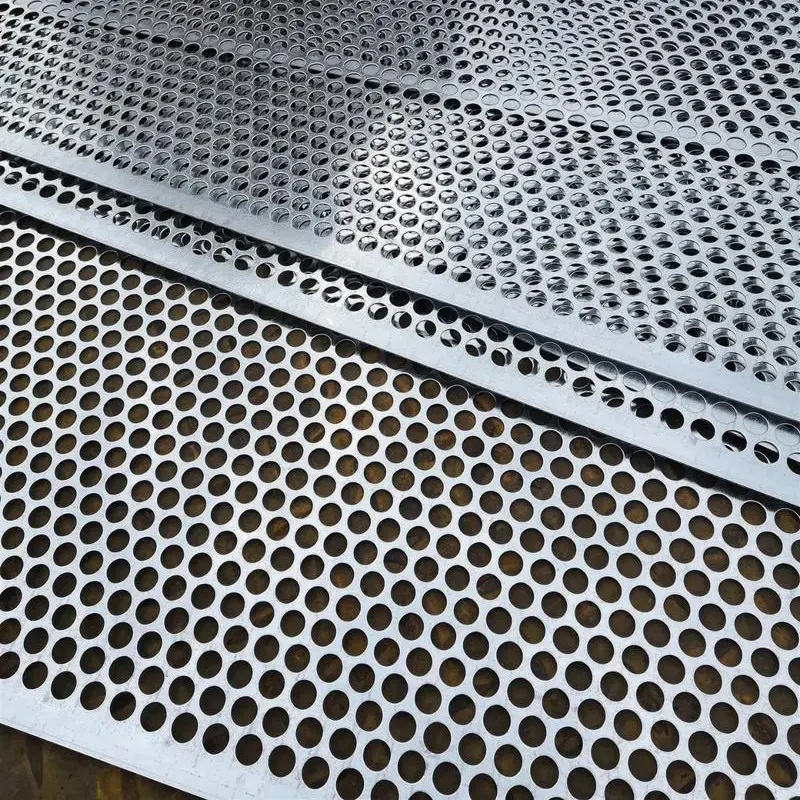 Silver perforated metal sheet with neatly arranged round holes, modern industrial style