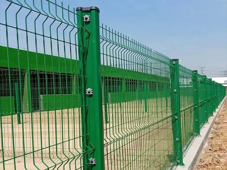 Welded wire mesh fence installed around a factory perimeter