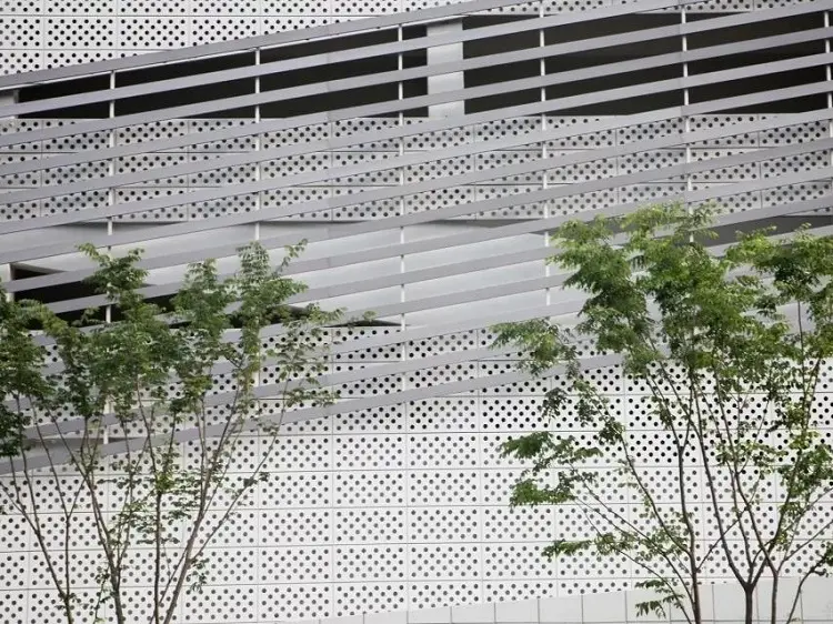 Perforated metal panels for architectural facade cladding