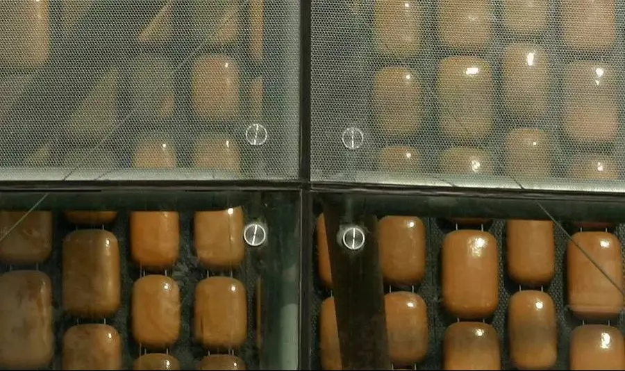 Close-up of laminated perforated metal mesh panels used on the Shanghai Oriental Art Center façade