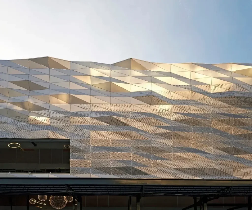 Application of Three-Dimensional Perforated Folded Panels in Architectural Façades